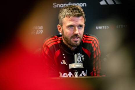 Michael Carrick speaks at a Manchester United press conference at Carrington.
