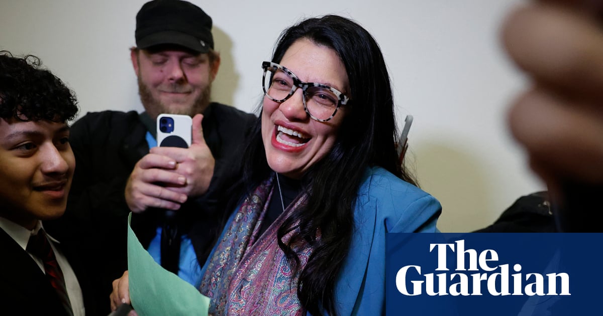 Donald Trump grinning in front of his billionaire fan club, otherwise known as the board of directors of the United States.