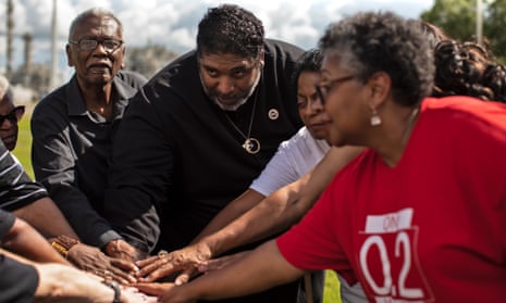 The Rev William Barber, center, will join residents of southern Louisiana’s ‘Cancer Alley’ during a two-week march to win support for a campaign against toxic pollution.