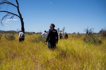 Alice Springs locals join police on the fourth day of searching the long grass and scrub near the Old Timers town camp
