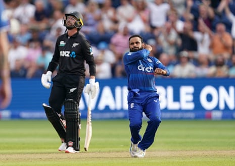 England’s Adil Rashid celebrates taking the wicket of New Zealand’s Will Young.