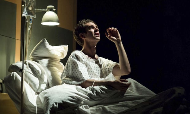 Andrew Garfield plays the lead during a hospital scene in the Angels in America production at Britain’s National Theatre in London. 