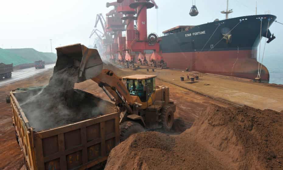 File photo of iron ore from Australia being unloaded at Rizhao port, China