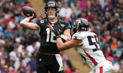 The Jaguars quarterback, Trevor Lawrence (left), in action at Wembley.