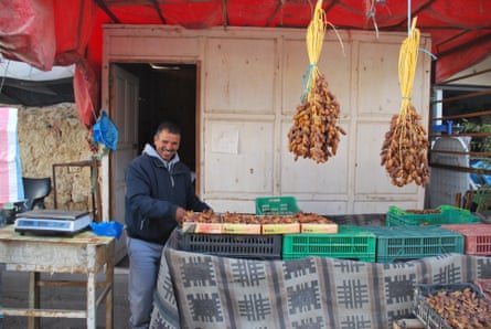 A man sells dates in Kebili market, Tunisia