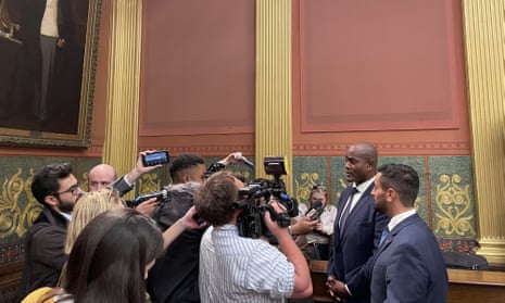 Michigan state representative Joe Tate talks with reporters in Lansing after house Democrats voted to make him the first Black speaker in state history.
