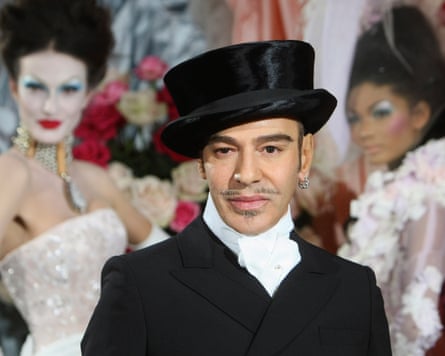 John Galliano poses at the end of the presentation of the Dior spring-summer 2010 fashion show.