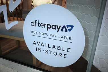 An Afterpay sign is seen in a store window in a shopping centre in Sydney. Over the past year, the share price of Afterpay has more than tripled.