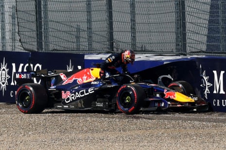 Max Verstappen climbs out of his Red Bull after crashing during qualifying at the Red Bull Ring
