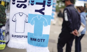 Matchday scarves are sold outside the ground before kick-off.