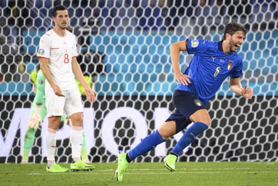 Manuel Locatelli (right) celebrates after scoring Italy’s second goal in their 3-0 win over Switzerland.