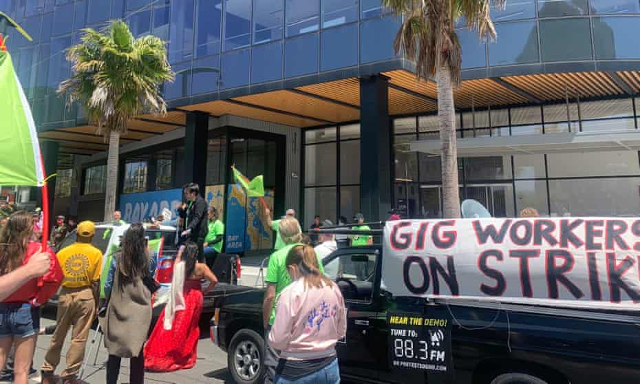 Drivers protest at Uber’s San Francisco headquarters on Wednesday.