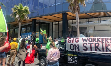 Drivers protest at Uber’s San Francisco headquarters on Wednesday.