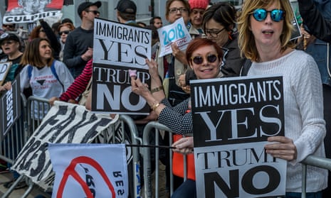 People protest Donald Trump’s position on immigration.