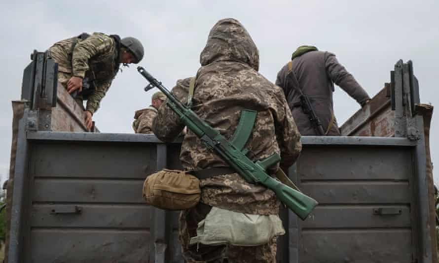 Ukrainian soldiers of the territorial defense forces take part in a training exercise.