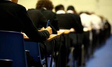 students sit exams