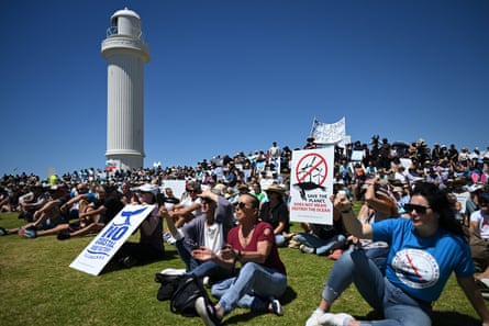 Residents attend a rally at Flagstaff Hill in Wollongong on 29 October against a proposed offshore windfarm.