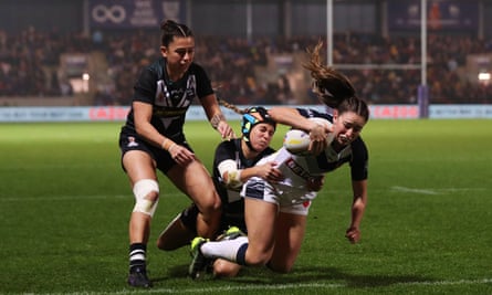 England’s Fran Goldthorp goes over for the first try in the Women’s Rugby League World Cup semi-final against New Zealand.