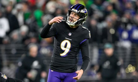 Justin Tucker watches another missed field goal.