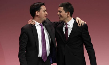 Ed and David Miliband hug each other on stage at the Labour party's conference in 2010