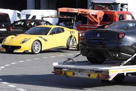 Eleven of Obiang’s luxury cars are towed away.