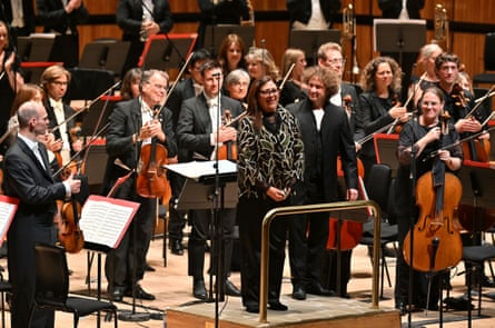 Delicately scored … Gabriela Ortiz, centre, takes the applause beside Santtu-Matias Rouvali for her new composition.