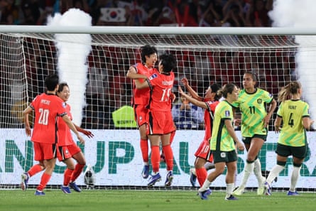 Kim Shin-ji celebrates after scoring for South Korea