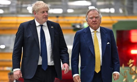  Boris Johnson and  Lord Bamford, the JCB chair, during a visit to a JCB factory in India in April.