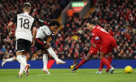 Willian fires the ball past the Liverpool captain, Virgil van Dijk, to put Fulham 1-0 ahead
