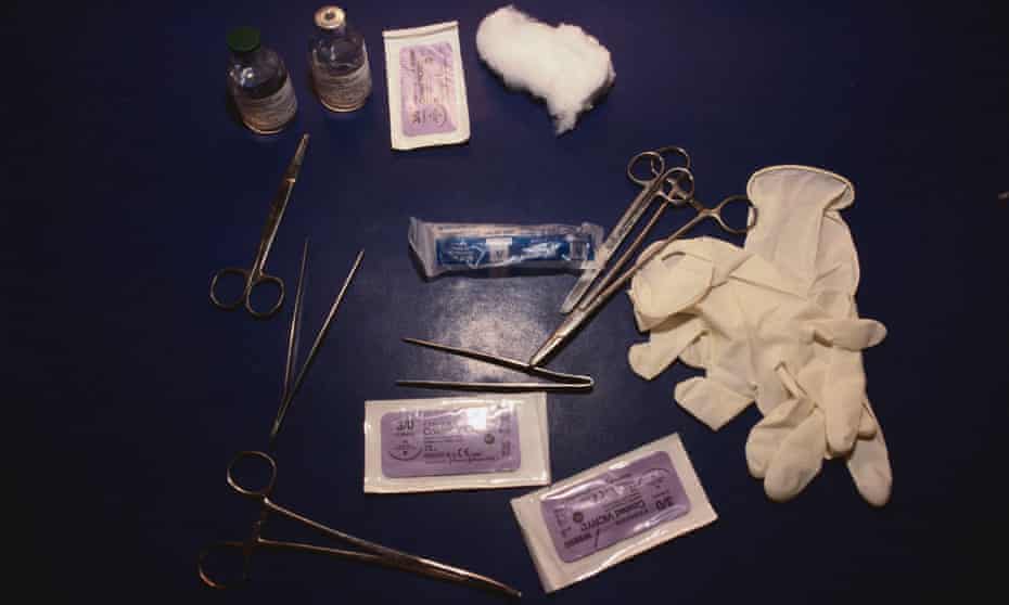 Forceps, rubber gloves and other items used in female genital mutilation
