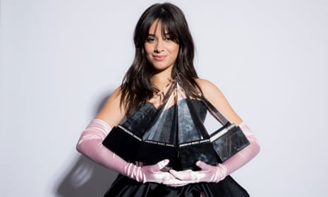 Camila Cabello holds her four American Music Awards.