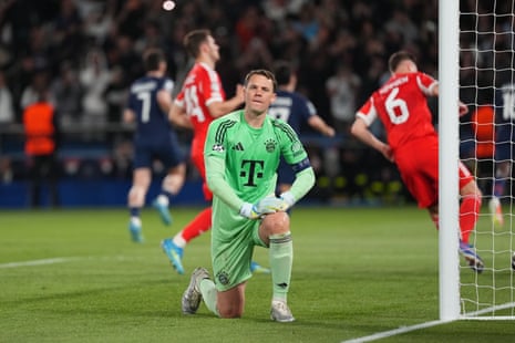 Bayern Munich keeper Manuel Neuer reacts after failing to save a penalty kick by Ousmane Dembele put PSG 3-2 ahead.
