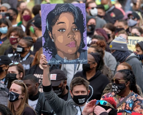 a person holding a sign