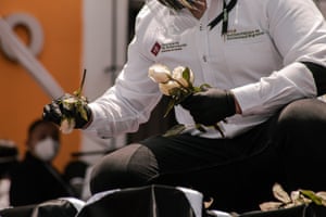 The remains arrived in postal boxes so a black cloth and flowers were placed on top to dignify their deaths.