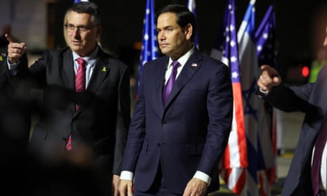 Israel’s foreign minister Gideon Sa’ar (L) welcomes Marco Rubio (R) as he arrives in Israel.
