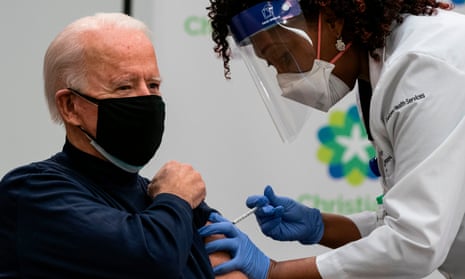 Biden receives his shot from medical worker Tabe Masa at the Christiana Care campus in Newark, Delaware. Biden said the Trump administration ‘deserves great credit’ for the vaccine.