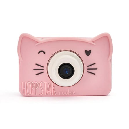 A Hoppstar Rookie Digital Camera. A dusty pink handheld camera with animal ears, whiskers and a winking eye.