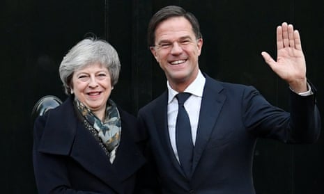 Theresa May is welcomed by Dutch Prime Minister Mark Rutte ahead of a meeting in the Hague, the Netherlands, on 11 December.