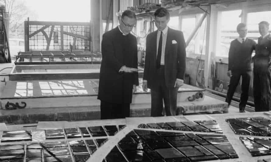 Patrick Reyntiens, right, leading the Archbishop of Liverpool, George Beck, on a visit to his studio in 1965 to see the stained glass panels made for the lantern tower of the Metropolitan Cathedral.