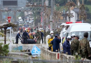Rescue operations continue after the floods hit Kumamoto prefecture on 04 July. More than 30 people are feared to have died and at least 14 are still missing