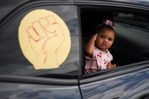 A young girl looks out of a car window during a justice ride organized by rapper Trae the Truth to celebrate Juneteenth, which commemorates the end of slavery in Texas, two years after the 1863 Emancipation Proclamation freed slaves elsewhere in the United States, amid nationwide protests against racial inequality, in Houston, Texas, U.S. June 19, 2020.