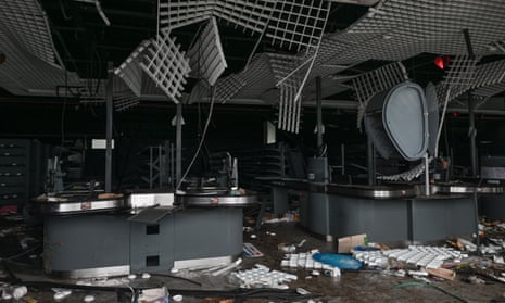 The plundered remains of a newly opened supermarket in Chornobaivka, Kherson, a month after Russia’s withdrawal from the city