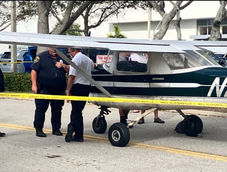 people next to a plane