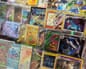 Single pokemon cards for sale, locked in a cabinet. These cards can be purchased in BathTCG or online - like the affected stolen cards.