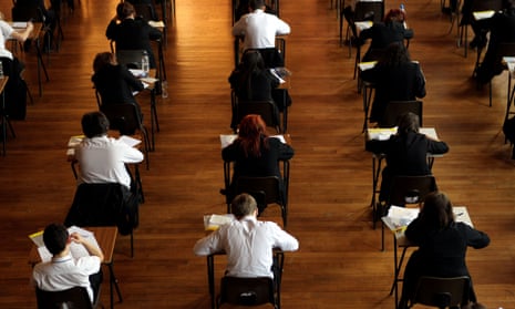 rows of pupils taking an exam