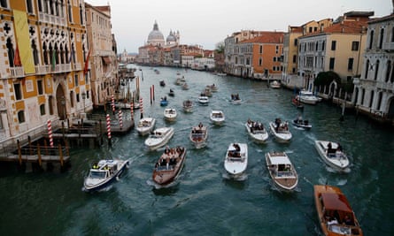 Boats on a canal in Venice.