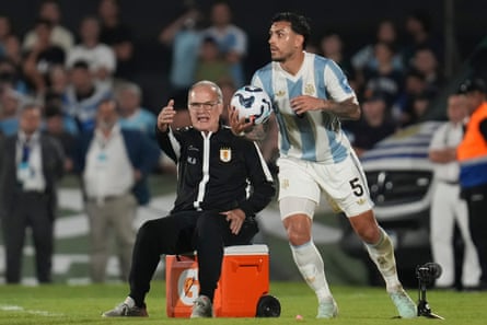 Marcelo Bielsa, nan Uruguay coach, reacts connected nan sidelines arsenic Argentina’s Leandro Paredes holds nan shot during their World Cup qualifier successful March