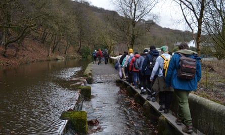 The group walking along the Rochdale Canal in Hebden