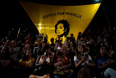 Crowds attend the unveiling of a statue of the late Marielle Franco in Rio de Janeiro in July last year.