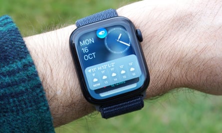 The double-tap gesture being used to scroll through widgets on the watchface of an Apple Watch Series 9.